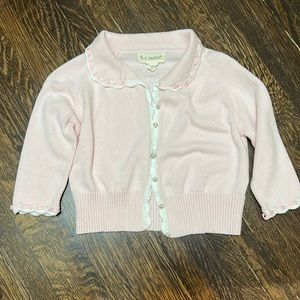 Pink and white cardigan with pearl buttons